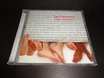 Between The Covers Charity Cd-rare W/ David Bowie, Mick Jagger, U2 & More--cd Like. Price: $17.99.