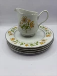 Rare Vintage Ekco International Exquisite Fine China Creamer And 4 Plate Set New. Price: $30.00.