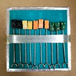 Vintage Set Of 10 Tiki Head Carved Stone Appetizer Picks Cocktail Skewers. Price: $19.99.