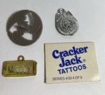 4 Vtg Cracker Jack Toys Prizes Tattoo Spin Top Marshall Badge License Plate Euc Used. Price: $14.00.