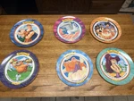 Disney Plate Set Of 6 Featuring Hercules, Phil, Pegasus, Zeus, Megara Used. Price: $100.00.