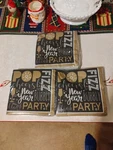Black, Gold & Silver Nye Beverage Napkins 125CT. New X6.5 Square 3 Packs. Price: $15.50.
