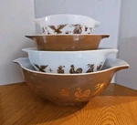 Pyrex Early American Cinderella Mixing Set 4 Gold Eagle Cat Used. Price: $110.00.