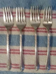 Exquisite Silverware Lot Of 4 Forks. Price: $10.00.