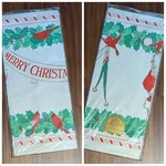 Vintage Hallmark Christmas Santa, Holly & Cardinals Paper Table Cover 60" X 102" New. Price: $12.95.