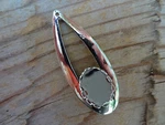 Valencia Rain Drop Pendant 10X14MM Oval Rhodium Silver (pkg 12) 1328 New. Price: $6.00.