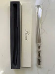 Ricci Argentieri - Bamboo Cake Knife New. Price: $45.99.