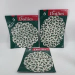 Lot - Vintage Amscan Christmas Paper Doilies Napperons Placemat Oval Round Holly New. Price: $19.99.