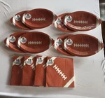 #135 Festive Voice Football Party Supplies Packs Of Plates And Napkins New. Price: $15.00.
