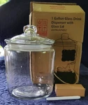Leraze 1 Gallon Drink Dispenser With Glass Lid. New Open Box. Price: $32.00.