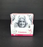 New Still Sealed Dolly Parton Double Sided Pink Drink Square Coasters Set Of 8. Price: $12.99.
